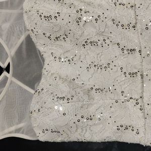 White lace and sequin cocktail dress by City Triangles.